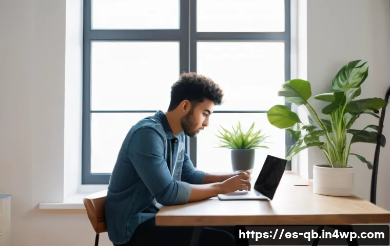 정보 다이어트법과 자아 성장 - A modern digital workspace scene showing a young Hispanic adult sitting at a clean desk with a lapto...